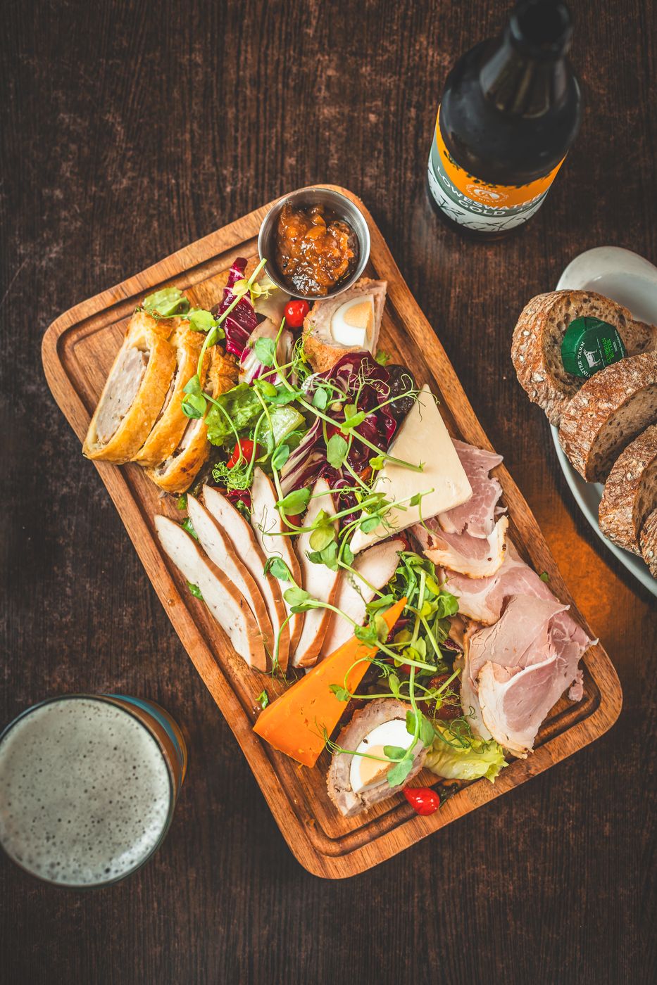 Charcuterie, local cheese and seeded bread, with a Cumbrian ale alongside.